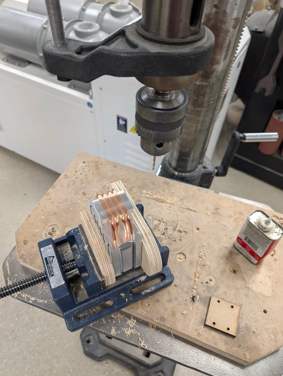 Drilling the cooler with a laser-cut jig